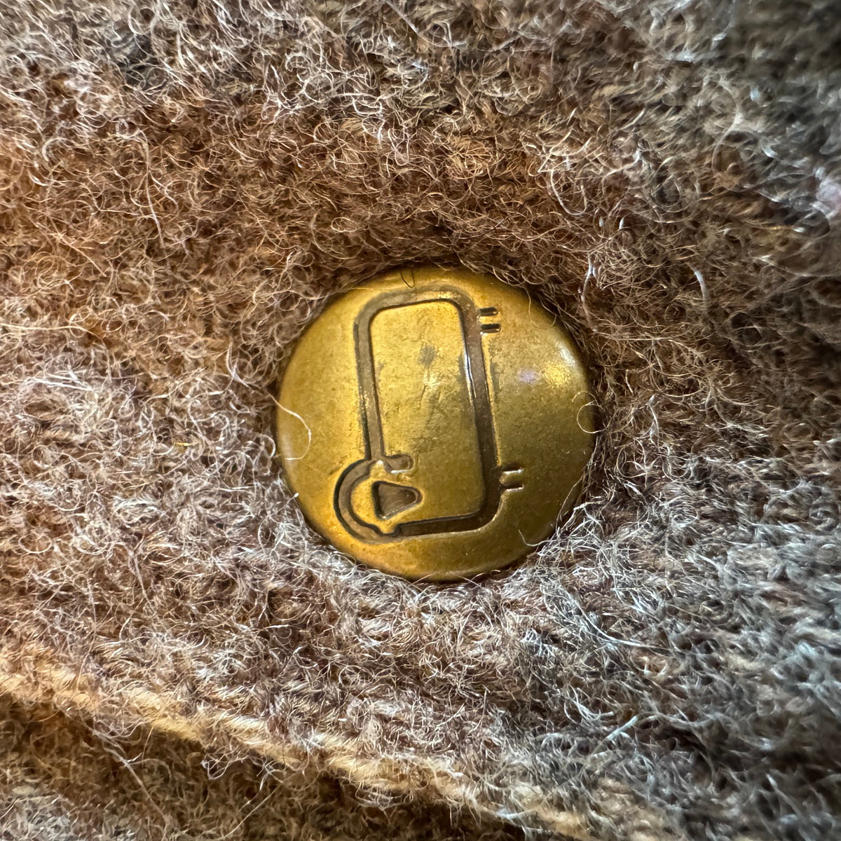Woolrich brass snap button