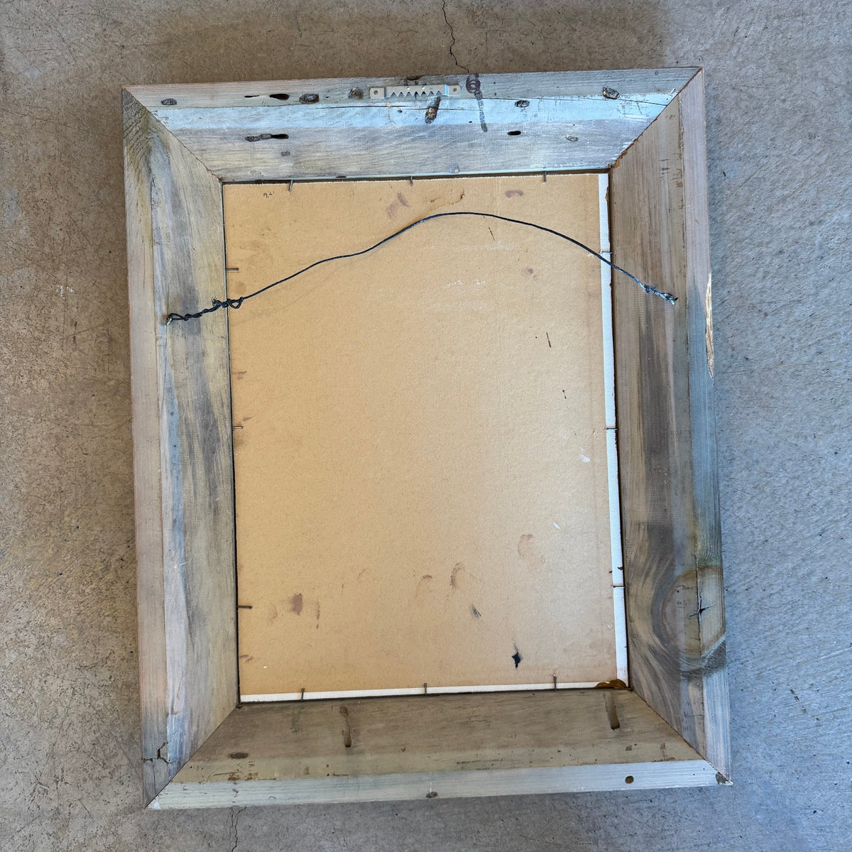 Back of frame with hanging wire