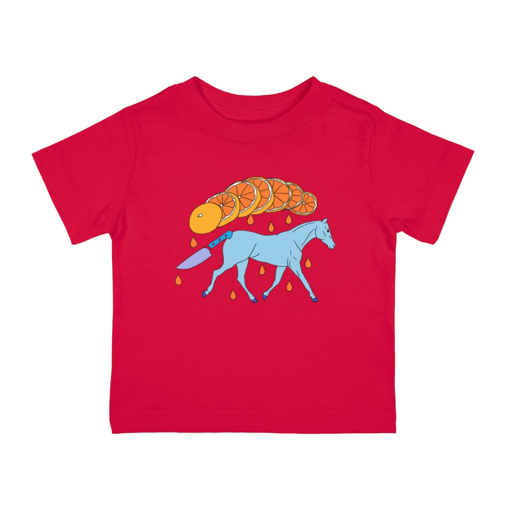 Red Cotten Kids t-shirt with a graphic of a blue galloping horse that has a knife for. tail and a sliced orange raining down orange juice above
