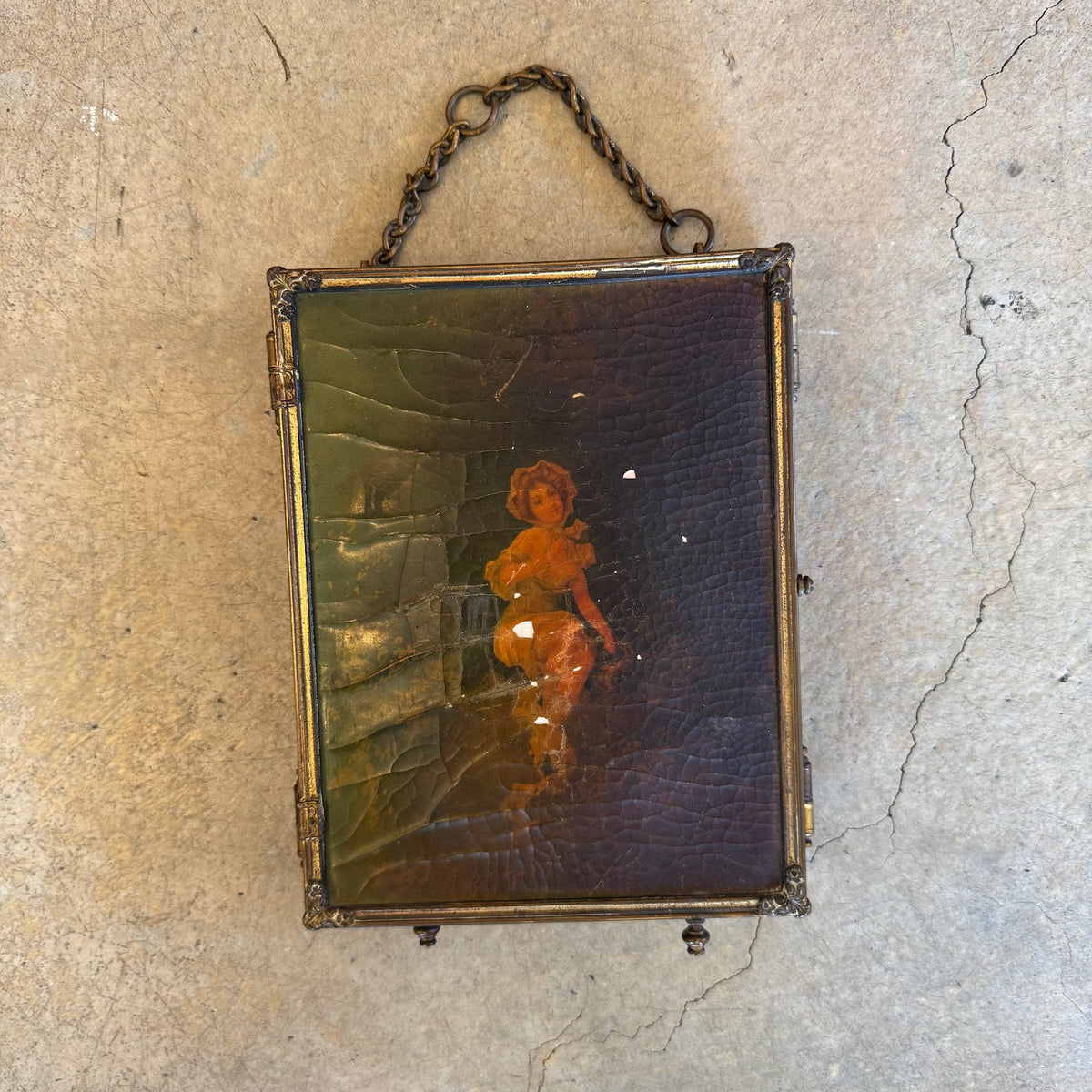 Mirror folded closed, painted panel and hanging chain