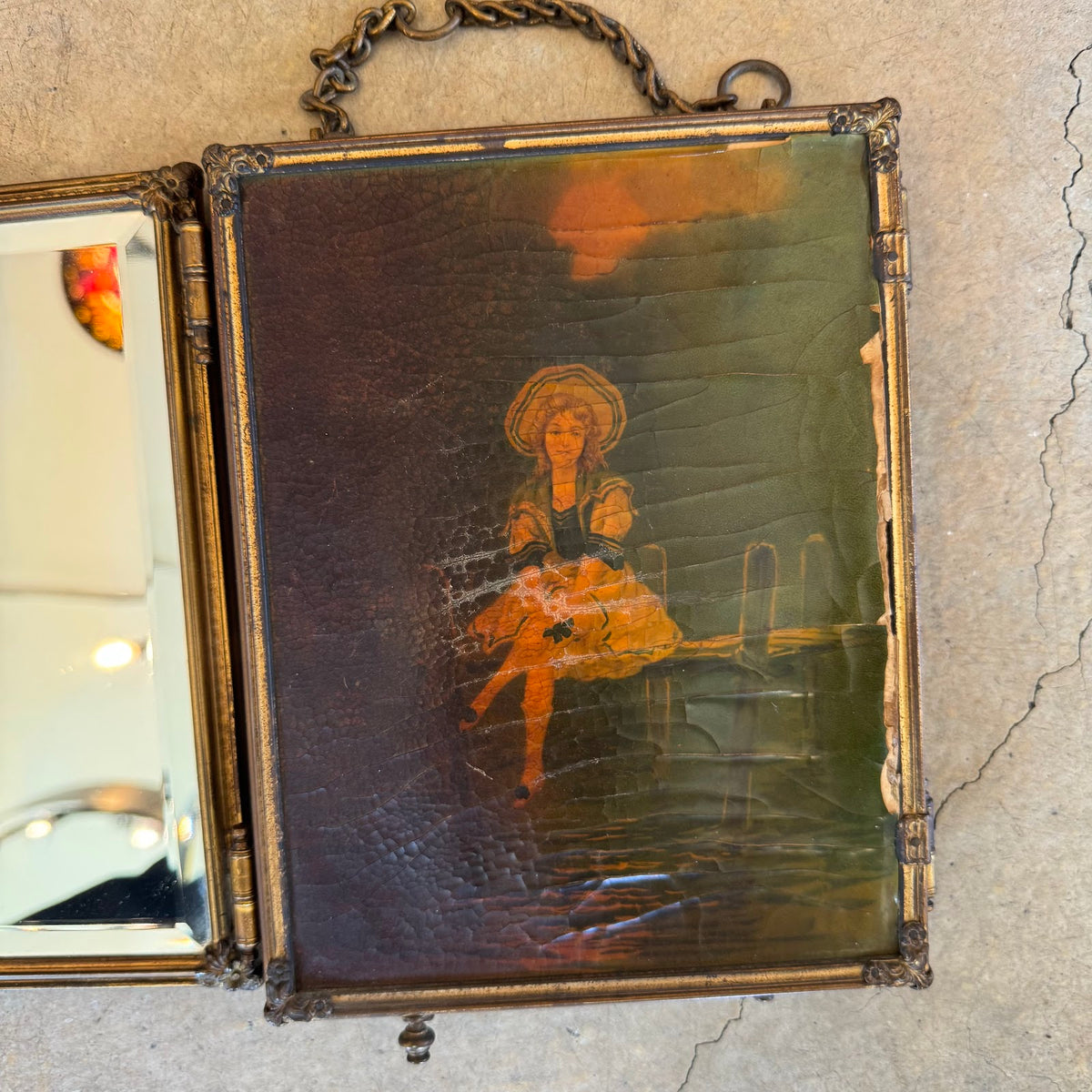 Mirror partly open, painted outer panel