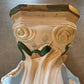 Statue base and serpent detail