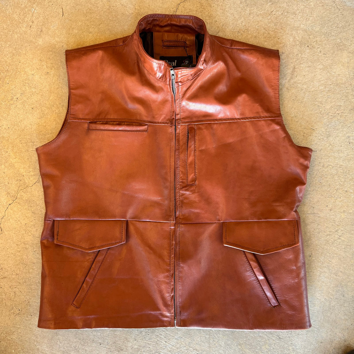 Brown leather zip vest, front